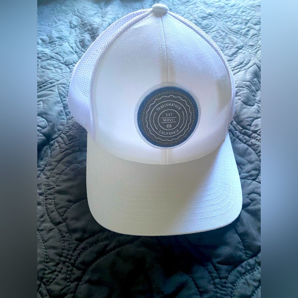 Brand new never worn TravisMatthew SnapBack white hat